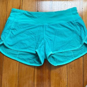 Lululemon teal shorts.